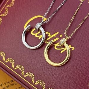nail necklace with diamonds at the head and tail