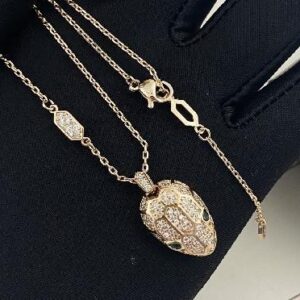 snake head green eye necklace-Bulgari